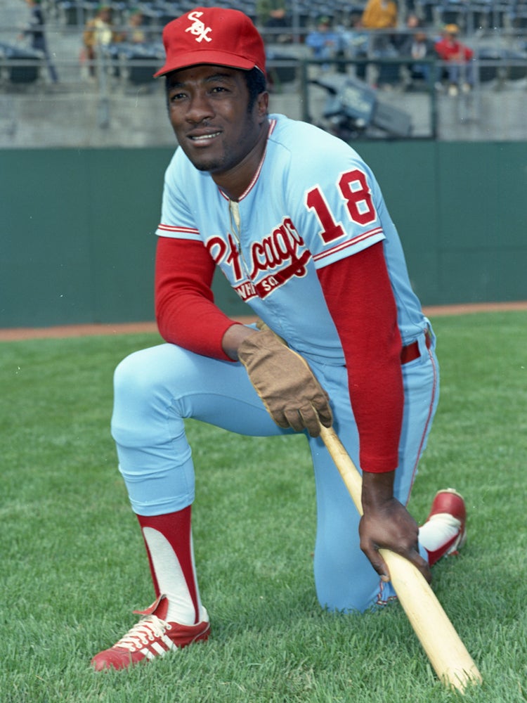 Posed portrait of Pat Kelly on one knee